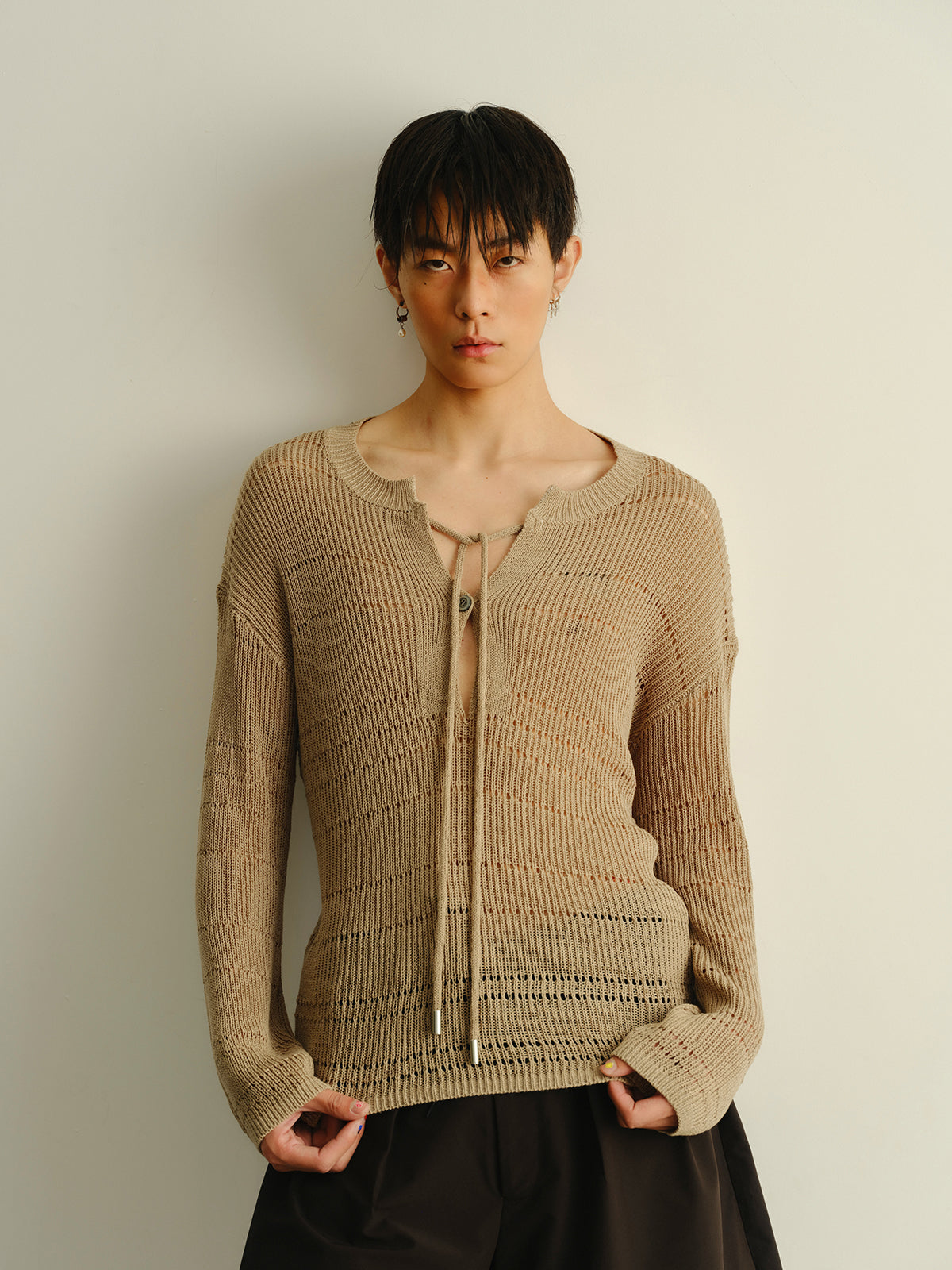 Big V-neck knitted sweater