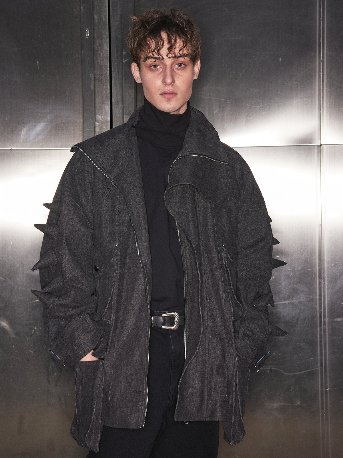 Black denim jacket with spikes