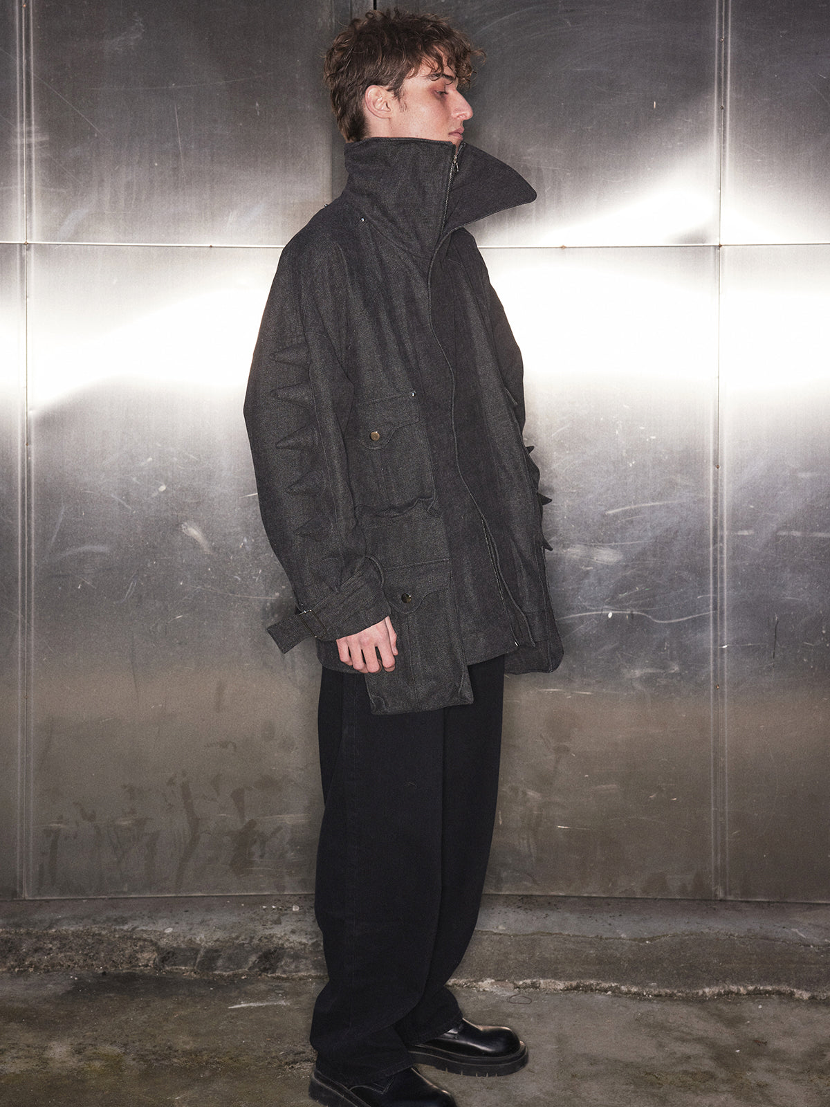 Black denim jacket with spikes