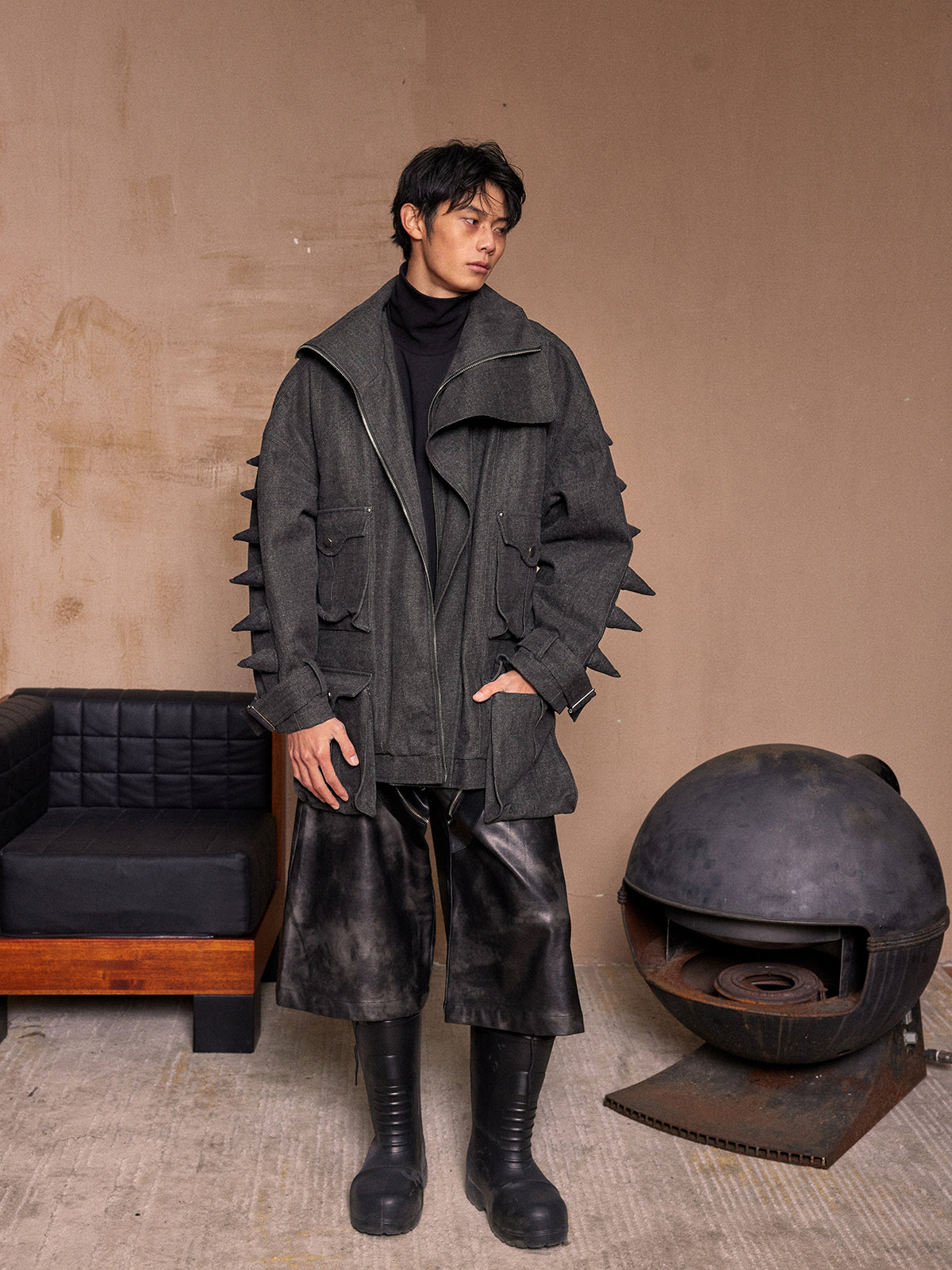 Black denim jacket with spikes