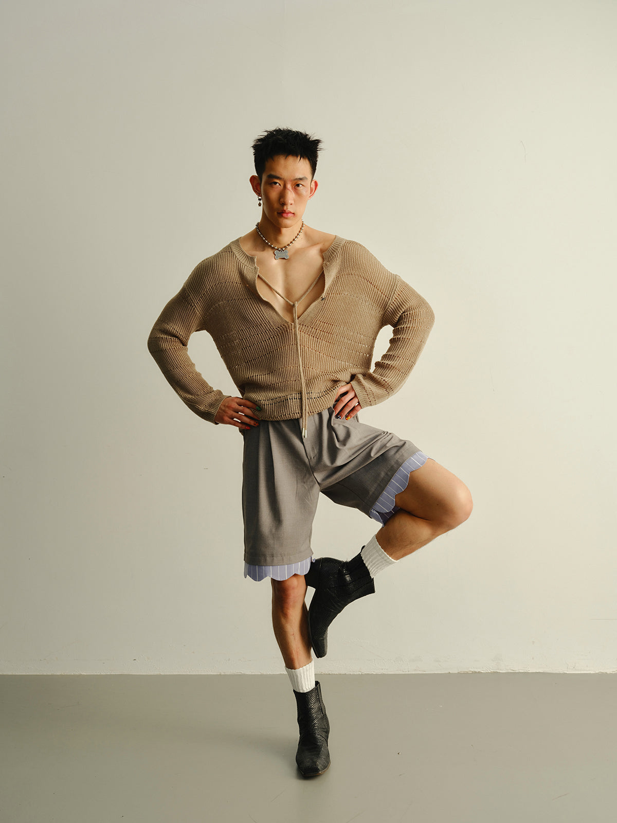 Big V-neck knitted sweater