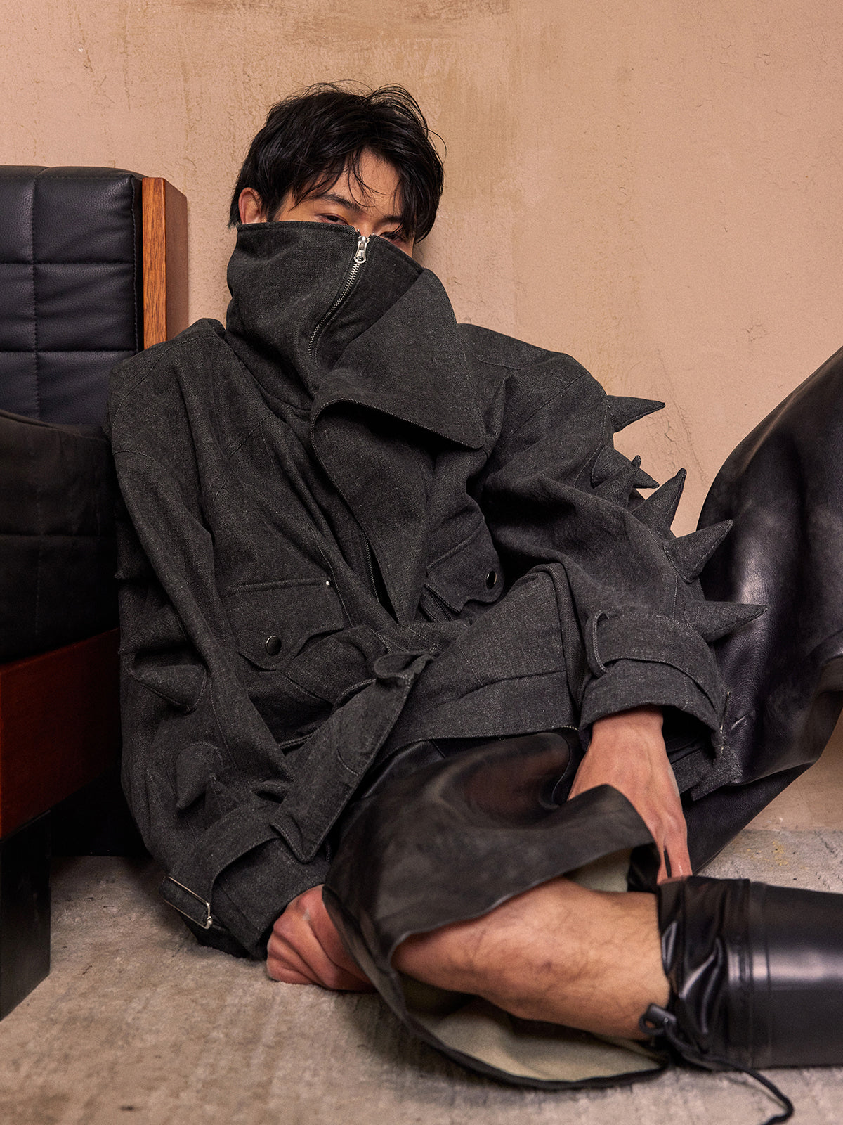 Black denim jacket with spikes