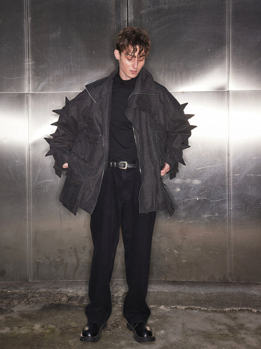 Black denim jacket with spikes