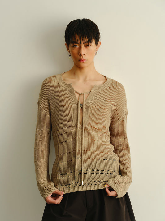 Big V-neck knitted sweater
