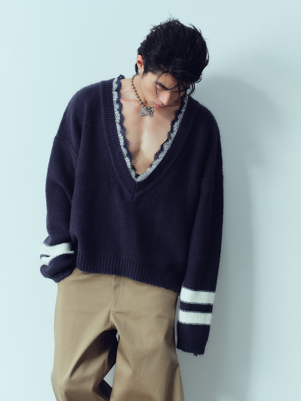 Deep V-layer lace silhouette perforated sweater