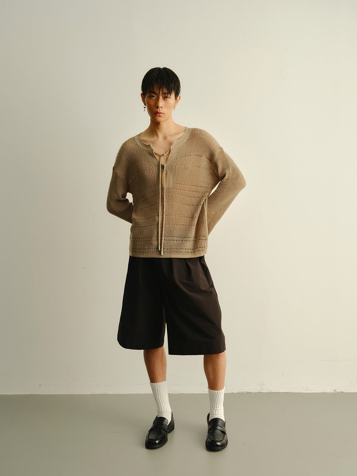 Big V-neck knitted sweater