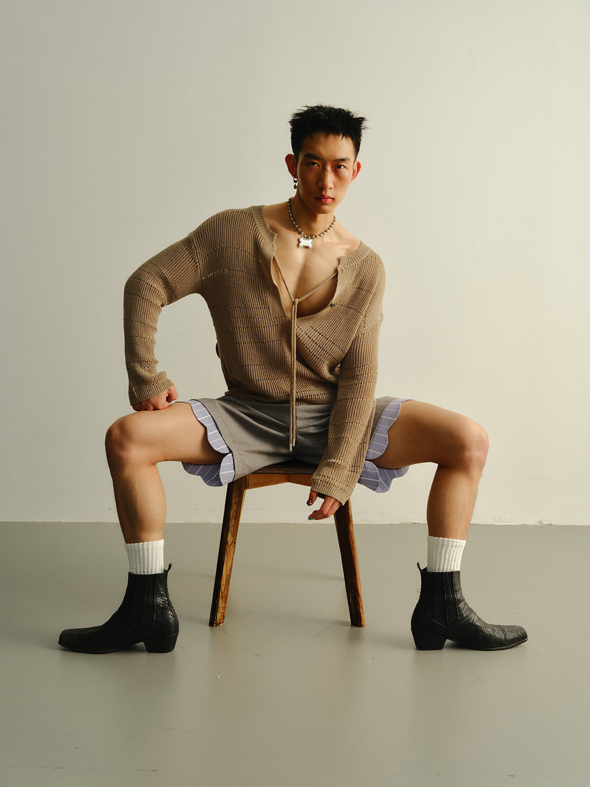 Big V-neck knitted sweater