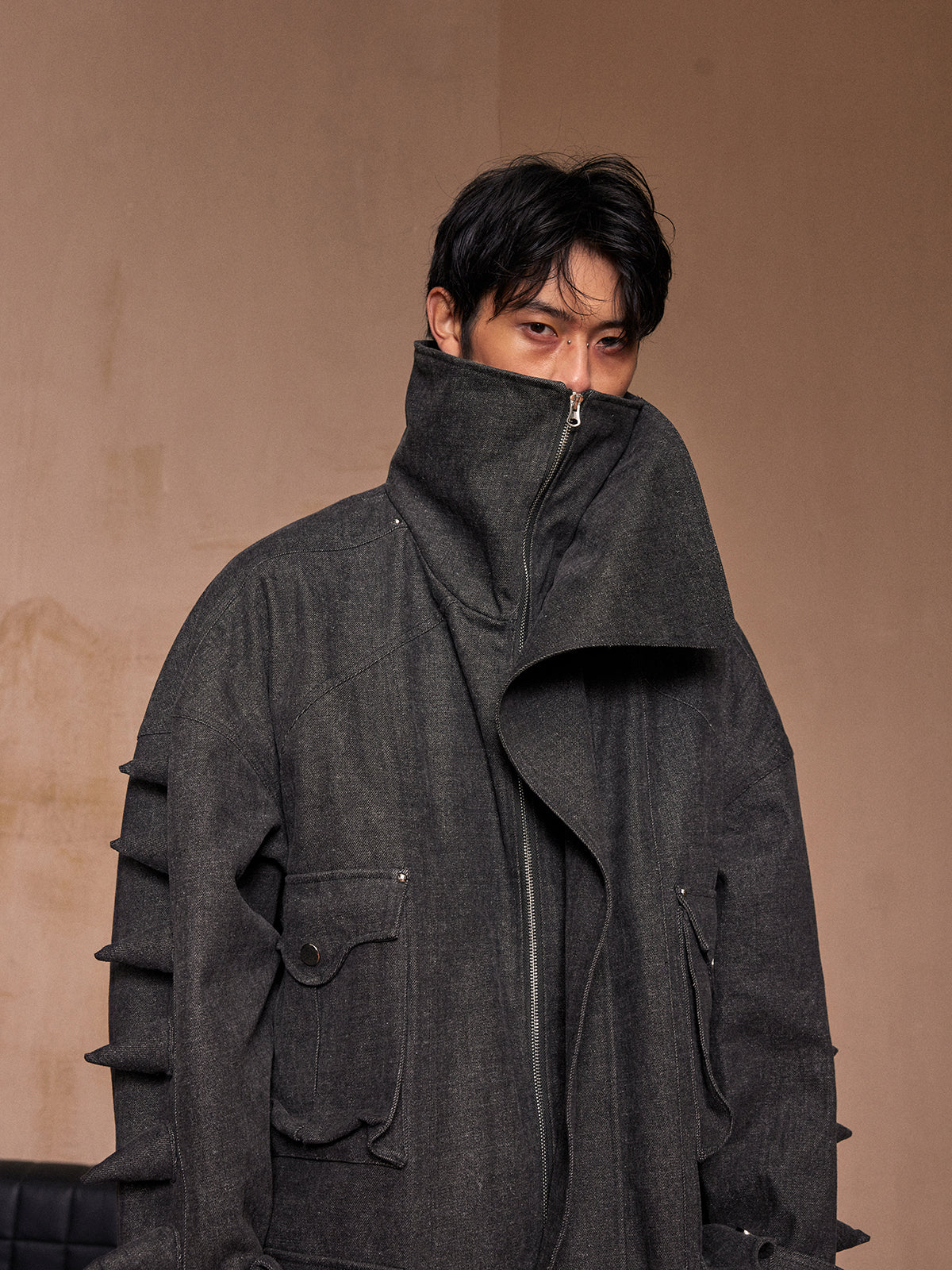 Black denim jacket with spikes