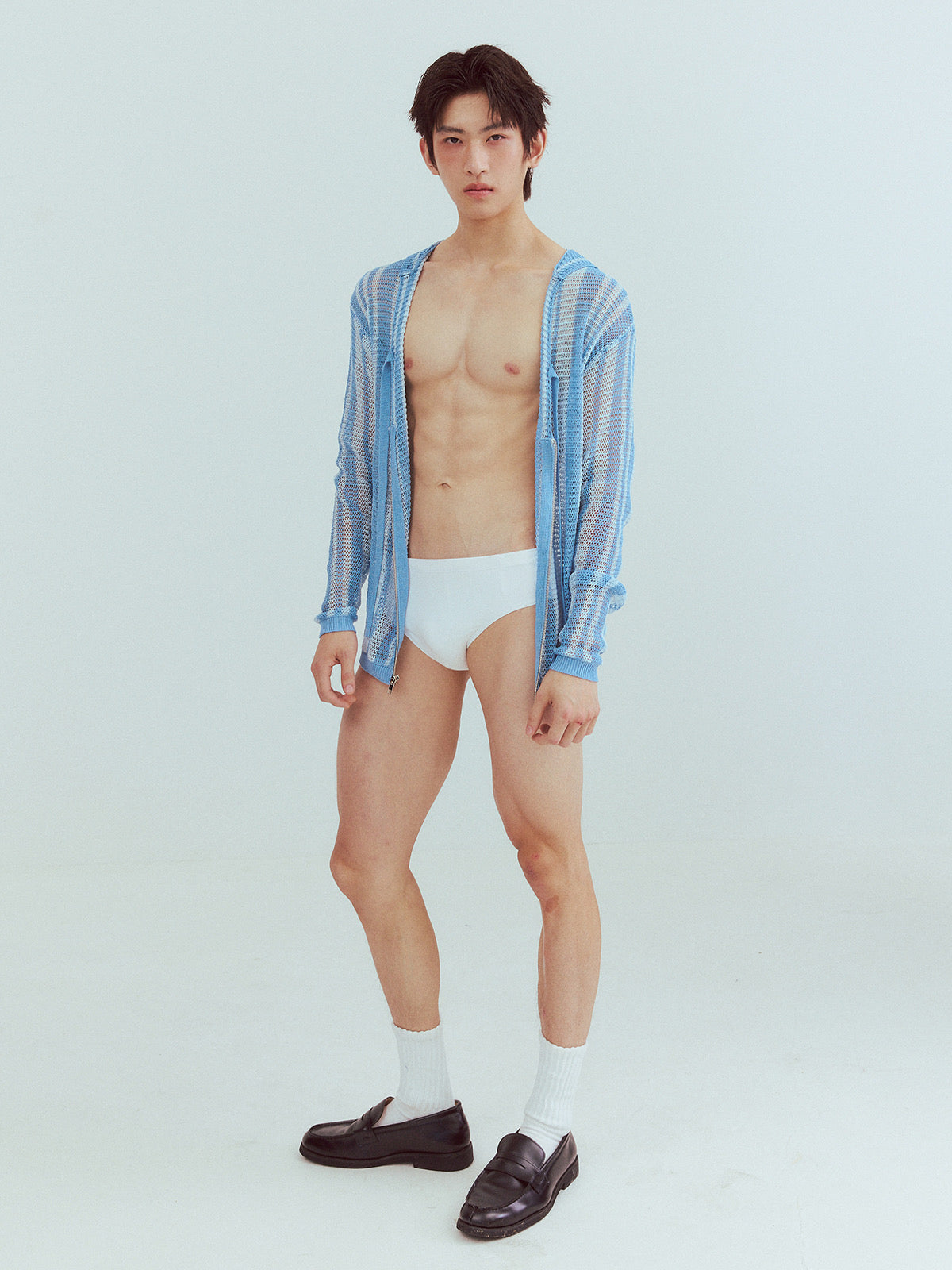 Vacation-style hollow-out knitted shirt