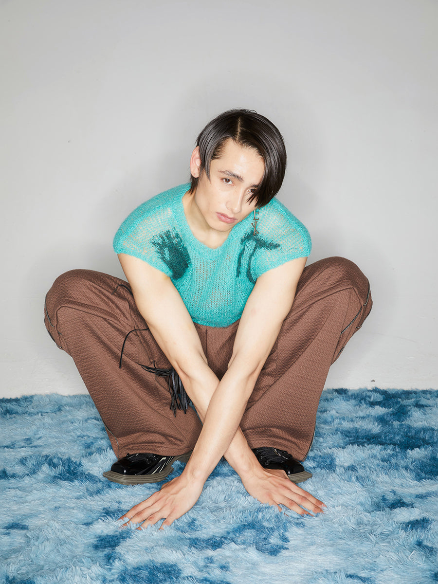 Hollow out sleeveless sweater