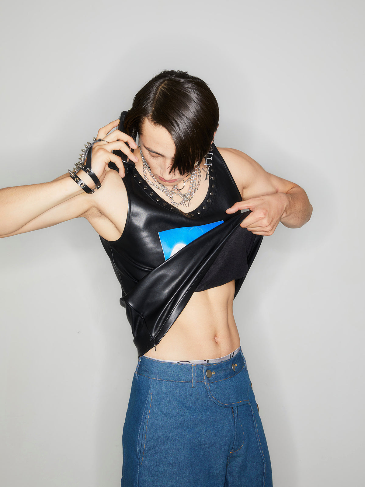 Printed rivet leather vest