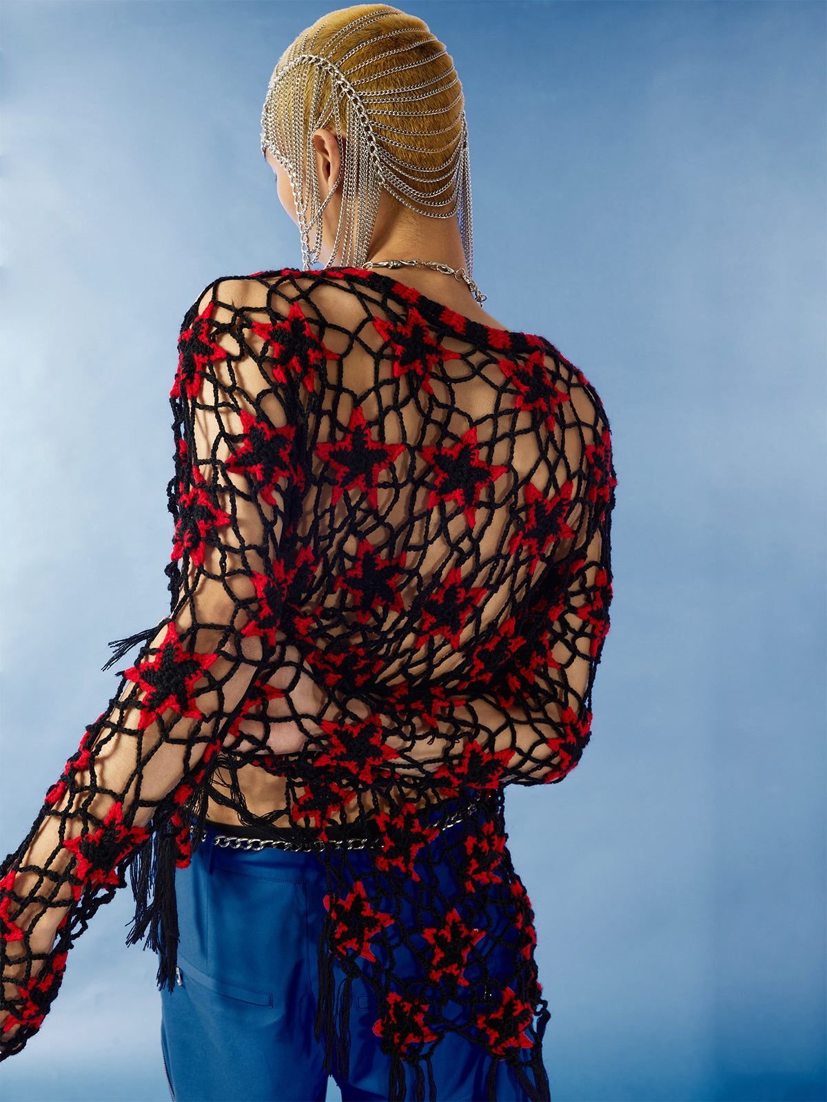 Star hollowed-out sweater