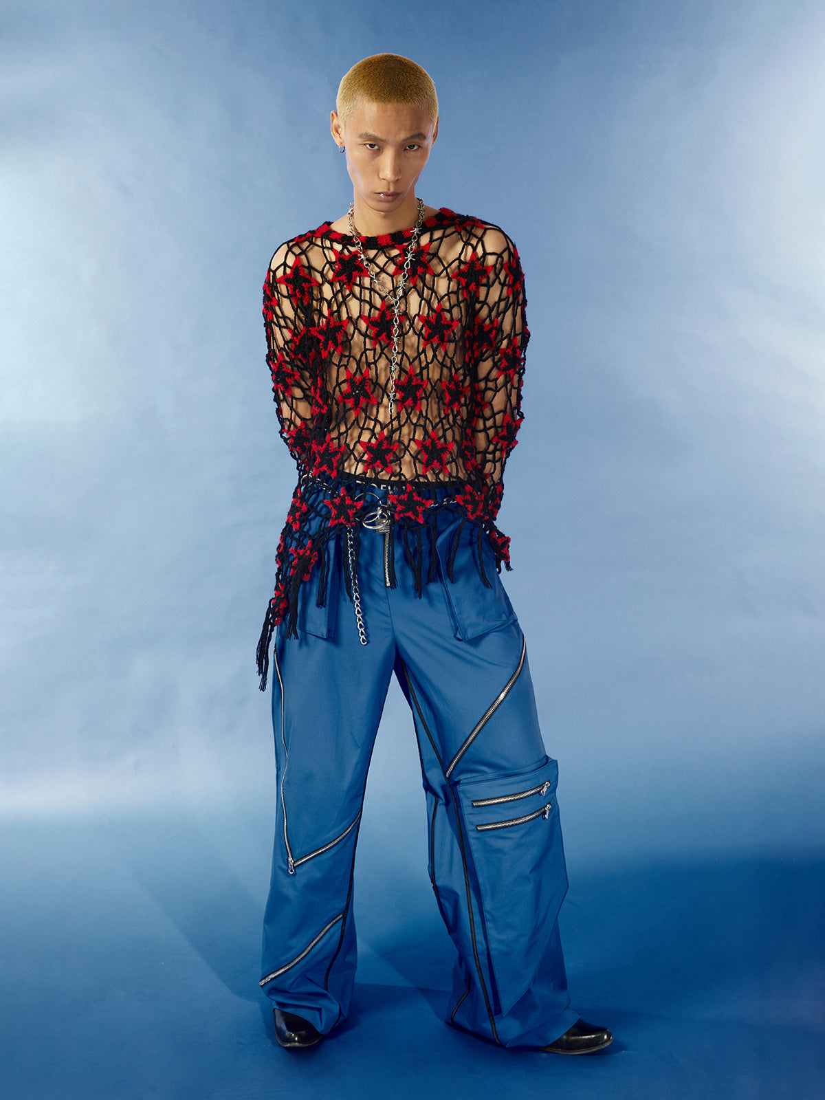 Star hollowed-out sweater